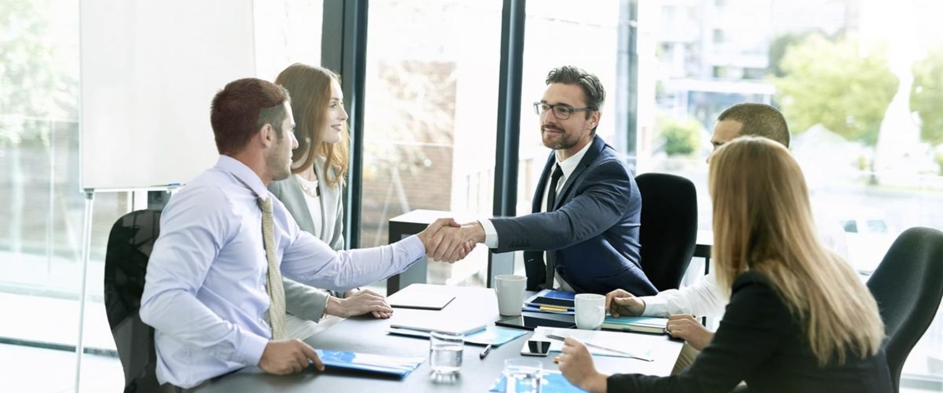 What strategies should entrepreneurs use when negotiating contracts and deals with partners and vendors?